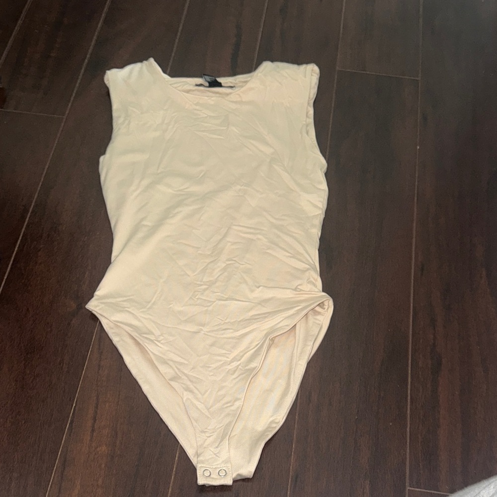 Cream Sleeveless Bodysuit with shoulder padding
